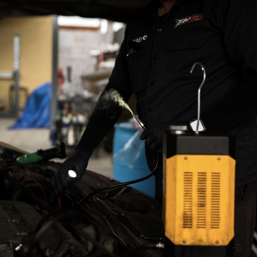 Smoke test for diagnosing engine vacuum leaks