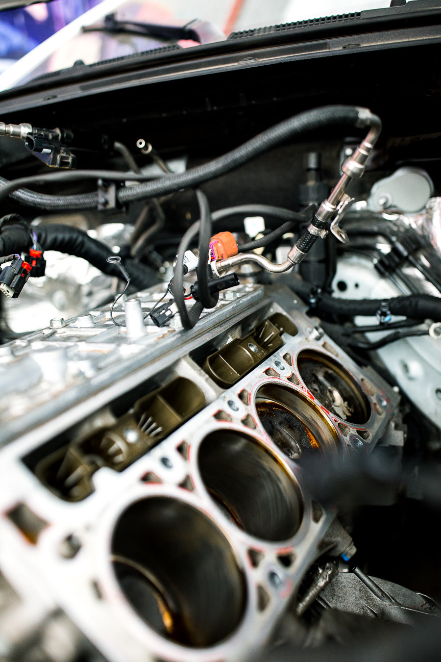 Engine internals — exposed cylinder bores during a rebuild